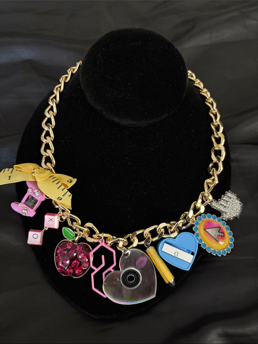 Betsey Johnson Gold Tone Chain Necklace with Pink, Blue and Yellow Charms